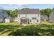 Expansive backyard with lush green lawn, perfect for outdoor activities and entertaining at 340 Olde Liberty Dr, Youngsville, NC 27596