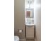 Small bathroom featuring a sink with vanity, overhead lighting, and toilet at 3721 Browning Pl, Raleigh, NC 27609