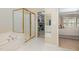 Primary bathroom featuring a glass-enclosed shower and separate soaking tub at 3924 Sunset Maple Ct, Raleigh, NC 27612