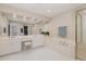 Bright bathroom features a large tub, glass enclosed shower and double sinks at 3924 Sunset Maple Ct, Raleigh, NC 27612