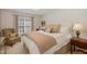 Comfortable bedroom featuring neutral tones and natural light at 3924 Sunset Maple Ct, Raleigh, NC 27612