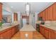 Spacious kitchen features stainless appliances, a large island, and beautiful cabinetry at 3924 Sunset Maple Ct, Raleigh, NC 27612