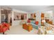 Inviting living room with stylish furnishings and seamless flow to dining and kitchen areas at 3924 Sunset Maple Ct, Raleigh, NC 27612