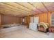 Spacious unfinished basement with exposed insulation, offering potential for customization and expansion at 3924 Sunset Maple Ct, Raleigh, NC 27612