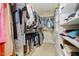 Spacious walk-in closet with custom shelving and ample storage space at 3924 Sunset Maple Ct, Raleigh, NC 27612