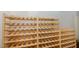 Wooden wine rack provides ample storage space for wine bottles in a cellar or pantry at 3924 Sunset Maple Ct, Raleigh, NC 27612
