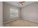 A bedroom with a ceiling fan and carpeted floor at 40 Paddle Wheel Ct, Franklinton, NC 27525