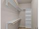 Walk-in closet with built-in shelving and hanging rods for optimal storage at 40 Paddle Wheel Ct, Franklinton, NC 27525