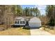 Attractive single Gathering home with an attached 2-car garage and well manicured front yard at 40 Paddle Wheel Ct, Franklinton, NC 27525