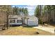 Attractive single Gathering home with an attached 2-car garage and well manicured front yard at 40 Paddle Wheel Ct, Franklinton, NC 27525