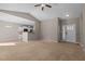 Open-concept living room with high ceilings and seamless transition to the kitchen and front entry at 40 Paddle Wheel Ct, Franklinton, NC 27525