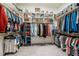 Spacious walk-in closet with custom shelving and ample storage space at 44 Ashwood Dr, Chapel Hill, NC 27516