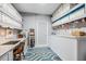 Organized craft room with ample shelving and storage space for creative projects at 44 Ashwood Dr, Chapel Hill, NC 27516