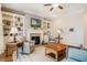 Bright living room with a fireplace and built-in shelving at 44 Ashwood Dr, Chapel Hill, NC 27516