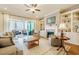Comfortable living room with fireplace, built-ins, and sliding doors to the outdoor deck at 44 Ashwood Dr, Chapel Hill, NC 27516