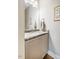 Elegant powder room featuring granite countertop and modern fixtures at 44 Ashwood Dr, Chapel Hill, NC 27516