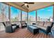 Relaxing screened porch with comfortable seating and serene outdoor views at 44 Ashwood Dr, Chapel Hill, NC 27516