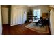 Functional office space with hardwood floors, closet, natural light, and room for work or study at 4401 Sprague Rd, Raleigh, NC 27613