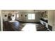 Versatile studio space with wood floors, a barre, natural light and built-in cabinets provides options for various activities at 4401 Sprague Rd, Raleigh, NC 27613