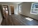 Bedroom with natural light, wood floors, and ensuite bathroom at 502 Yeowell Dr, Chapel Hill, NC 27514