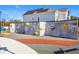 Community rock climbing wall offers recreation for different ages alongside gray homes at 502 Yeowell Dr, Chapel Hill, NC 27514