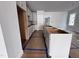 New kitchen construction featuring white cabinets, an open layout, and preparation for appliances at 504 Yeowell Dr, Chapel Hill, NC 27514