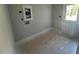 Unfinished laundry area with hookups and exterior door provides convenience and functionality at 504 Yeowell Dr, Chapel Hill, NC 27514