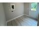 Well-lit laundry room includes tile flooring and direct access to outdoor at 504 Yeowell Dr, Chapel Hill, NC 27514