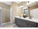Stylish bathroom with double vanity, modern fixtures, and ample counter space at 52 Commons Cir, Clayton, NC 27520