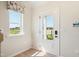 Inviting entryway with a view of a well-manicured front lawn at 52 Commons Cir, Clayton, NC 27520