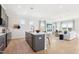 Open kitchen with a view of the living room at 52 Commons Cir, Clayton, NC 27520