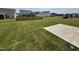 The backyard has recently installed sod with an area for a patio at 52 Commons Cir, Clayton, NC 27520