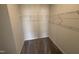 Walk-in closet features carpet and shelving units for optimal storage space at 52 Commons Cir, Clayton, NC 27520