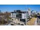Modern building exterior featuring expansive windows offering city views from this conveniently located property at 523 S West St # 409, Raleigh, NC 27601