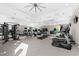 Community gym with treadmills, weight machines, exercise equipment, and mirrored walls at 523 S West St # 409, Raleigh, NC 27601