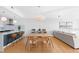 Open-concept living space with a modern kitchen, dining area, and comfortable living room at 523 S West St # 409, Raleigh, NC 27601