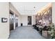 Modern lobby with elevators, sitting area, plants and a decorative marble accent wall at 523 S West St # 409, Raleigh, NC 27601