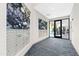 Hallway featuring mailboxes and artwork, with a view of a gym through glass doors at 523 S West St # 409, Raleigh, NC 27601