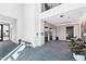 Condo lobby with elevators, a seating area, and access to the community gym at 523 S West St # 409, Raleigh, NC 27601