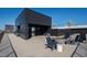 Relax on the rooftop terrace with comfortable seating and a modern firepit, perfect for entertaining guests at 523 S West St # 409, Raleigh, NC 27601