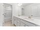 Modern bathroom showcasing double sinks, quartz countertops, and white cabinetry at 652 Marion Hills Way, Knightdale, NC 27545