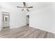 Bedroom features a ceiling fan, and connects to a bathroom and hallway at 652 Marion Hills Way, Knightdale, NC 27545