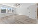 Bedroom with a ceiling fan and multiple windows letting in ample natural light at 652 Marion Hills Way, Knightdale, NC 27545