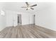 Spacious bedroom with a ceiling fan and open doorways at 652 Marion Hills Way, Knightdale, NC 27545