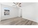 Well-lit bedroom with a ceiling fan and view of the neighborhood at 652 Marion Hills Way, Knightdale, NC 27545