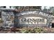 Stone sign for Glenmere Cove neighborhood with landscaped flowers at 652 Marion Hills Way, Knightdale, NC 27545