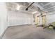A spacious two-car garage showing door openers at 652 Marion Hills Way, Knightdale, NC 27545