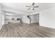 Spacious living area showcases hardwood floors and an open floor plan into the modern kitchen at 652 Marion Hills Way, Knightdale, NC 27545
