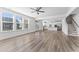 Open-concept living area with hardwood floors and seamless flow into a bright, modern kitchen at 652 Marion Hills Way, Knightdale, NC 27545