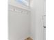 Mudroom area with coat hooks for storage and a door leading to the outside at 652 Marion Hills Way, Knightdale, NC 27545